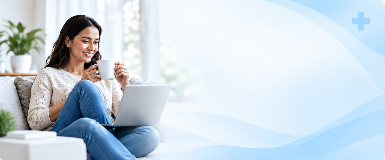 Woman using a laptop while relaxing at home